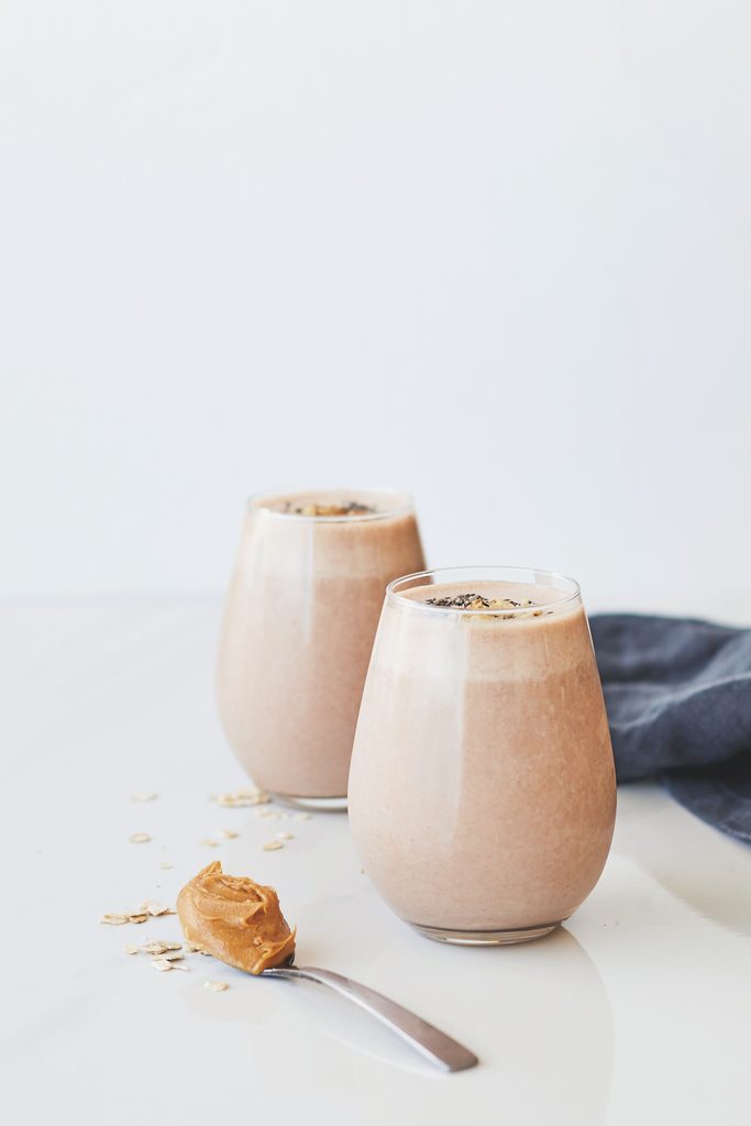Peanut butter chocolate banana smoothie with a tablespoon of peanut butter. 